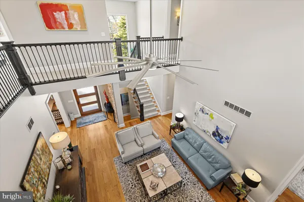 a view of backyard with swimming pool and sitting area