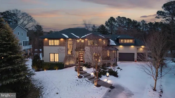 a living room with furniture fireplace and a flat screen tv