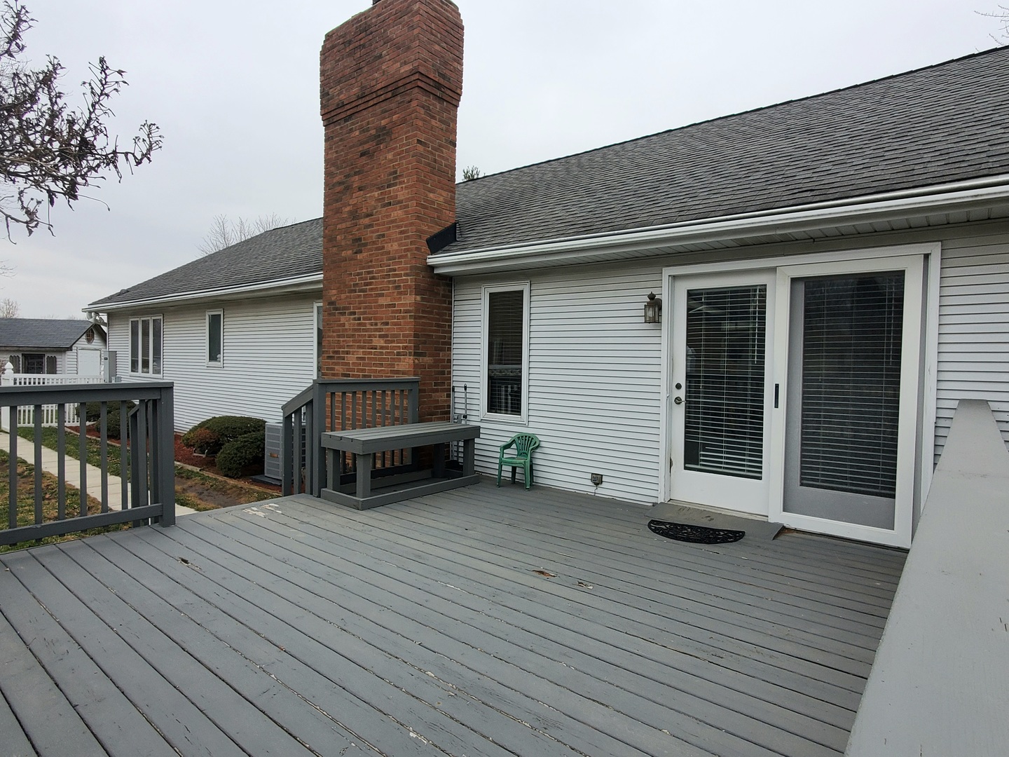 19212 Weber Road Mokena, IL 60448 - Photo 22 of 24 a view of a house with wooden deck and furniture
