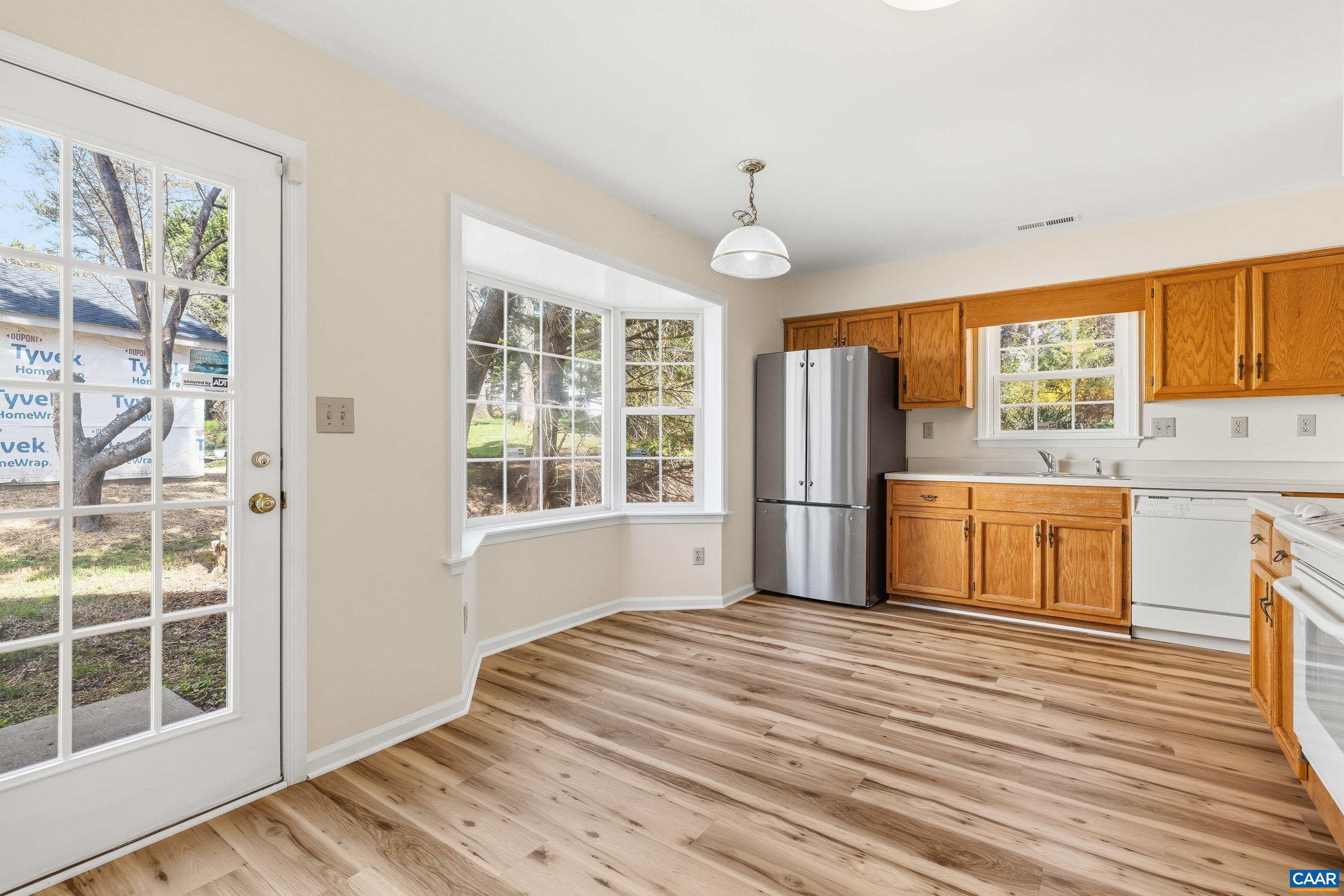 3041 Copper Knoll Road Charlottesville, VA 22911 - Photo 13 of 30 a room with a bed and a large window
