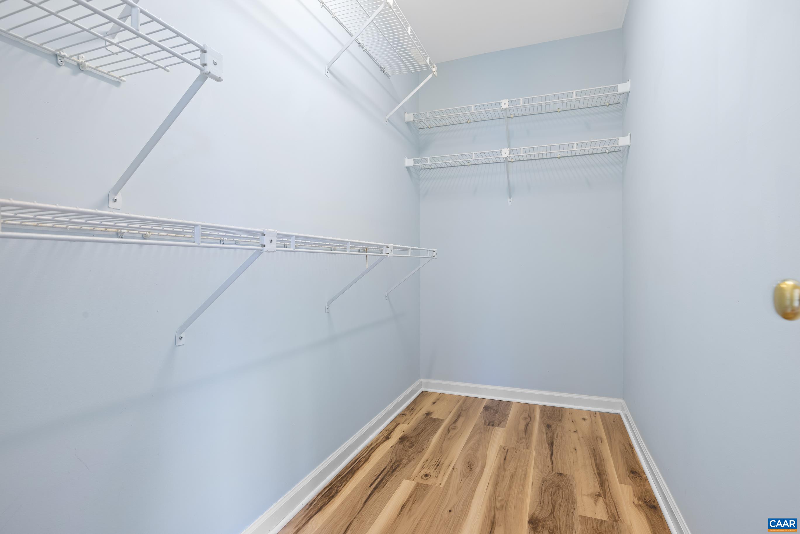 3041 Copper Knoll Road Charlottesville, VA 22911 - Photo 19 of 30 a view of a room with racks on the wall