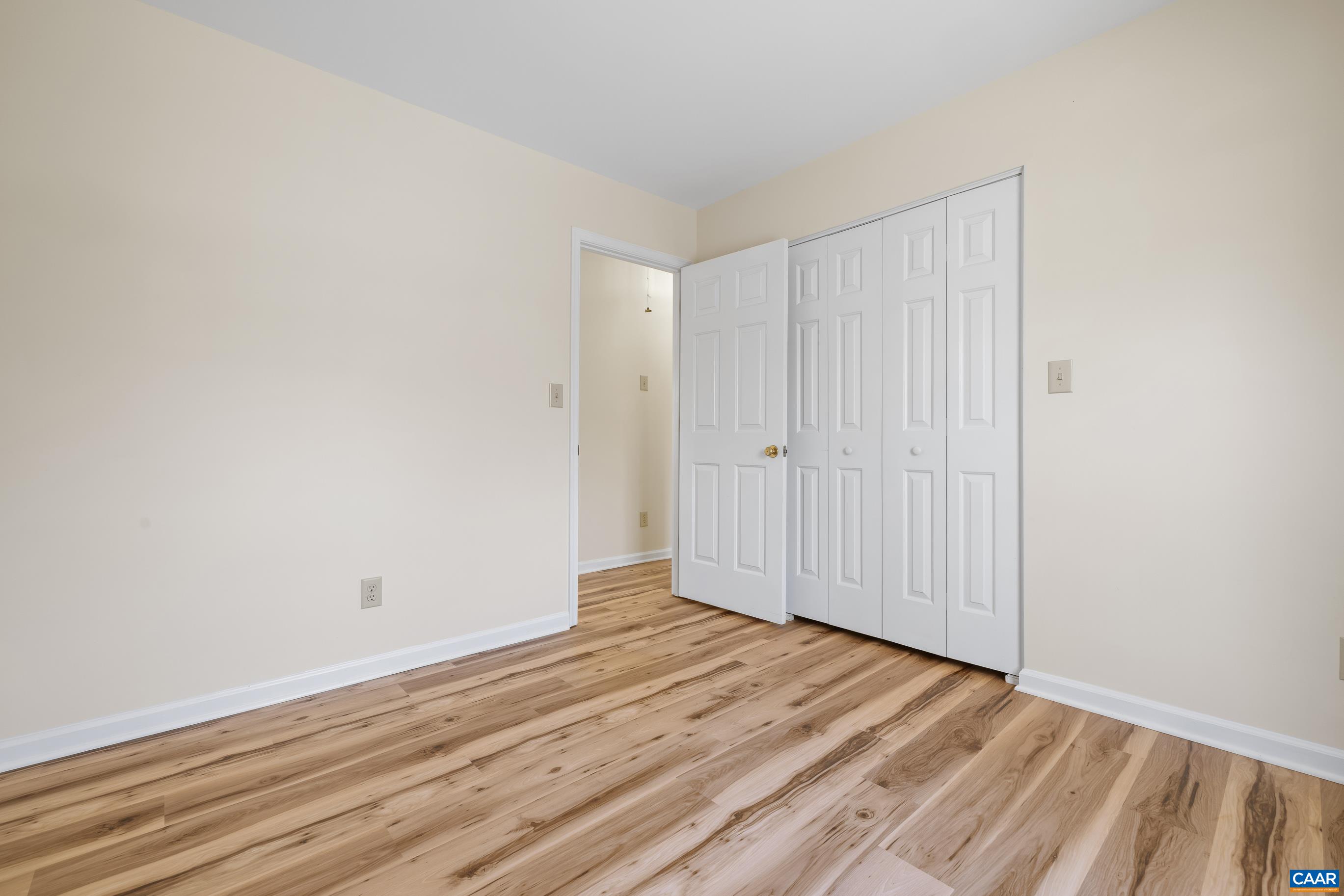 3041 Copper Knoll Road Charlottesville, VA 22911 - Photo 24 of 30 a view of room with wooden floor