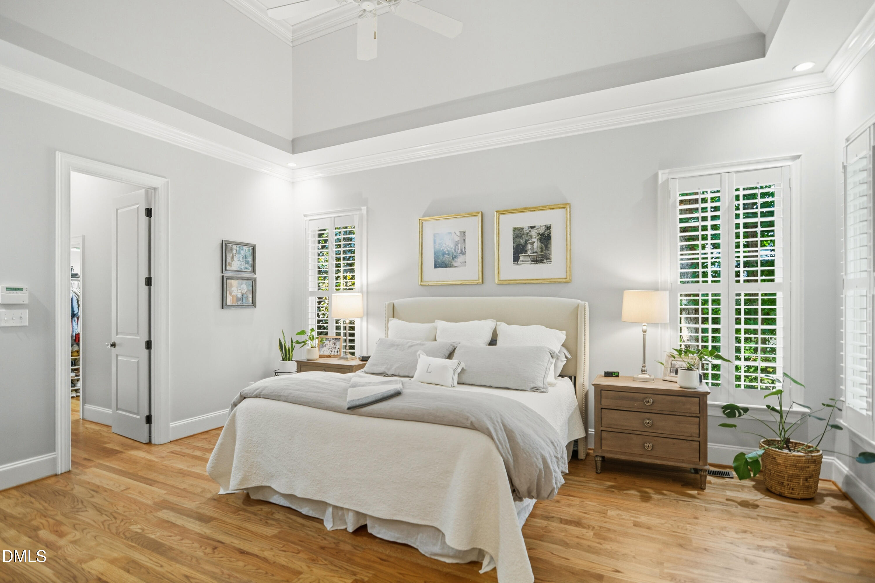 1409 Caistor Lane Raleigh, NC 27614 - Photo 17 of 46 a bedroom with a bed a couch and a window