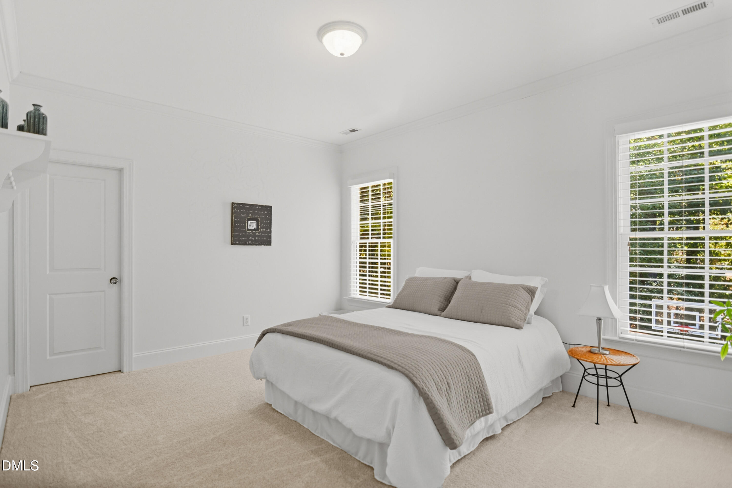 1409 Caistor Lane Raleigh, NC 27614 - Photo 21 of 46 a bedroom with a bed and a window