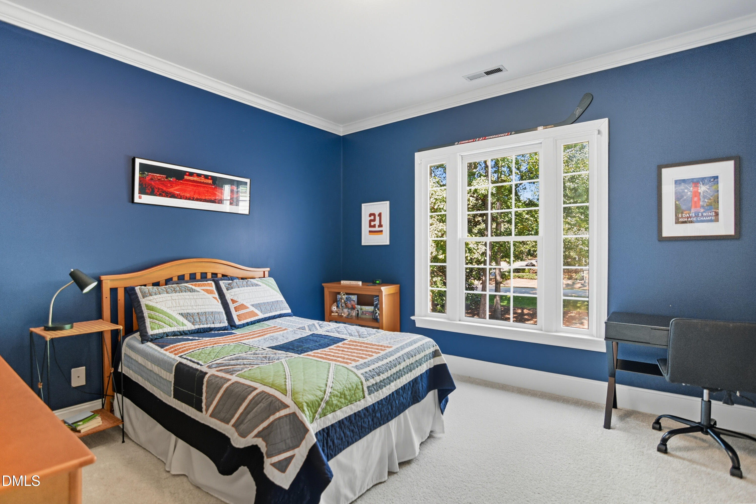 1409 Caistor Lane Raleigh, NC 27614 - Photo 22 of 46 a bedroom with a bed and a window