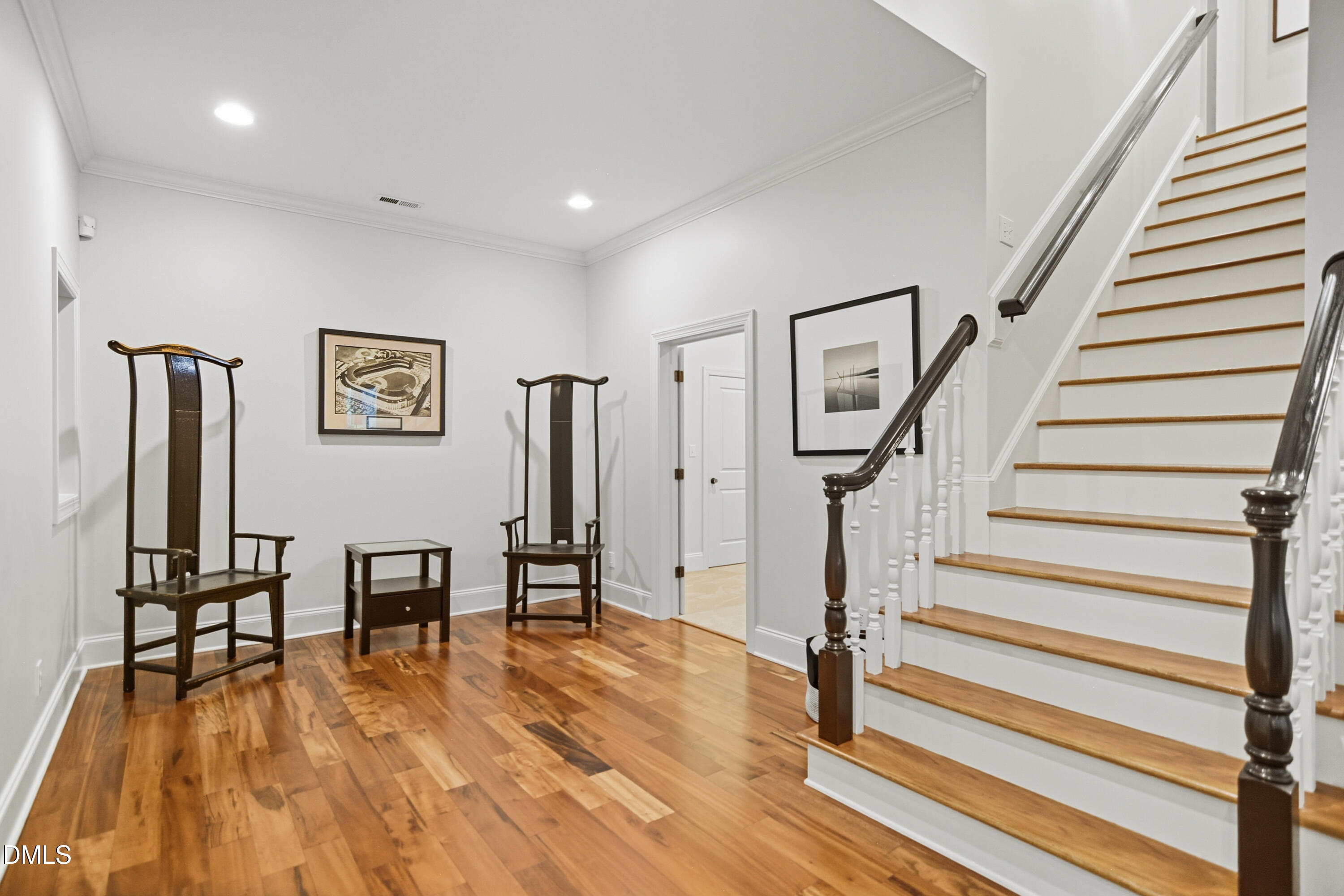 1409 Caistor Lane Raleigh, NC 27614 - Photo 29 of 46 a view of a livingroom with wooden floor and furniture