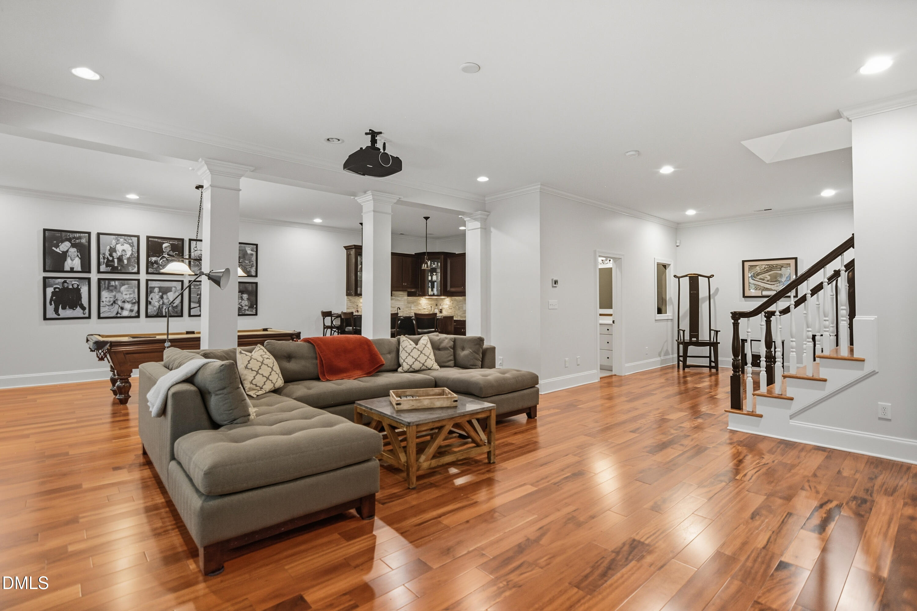 1409 Caistor Lane Raleigh, NC 27614 - Photo 33 of 46 a living room with furniture and wooden floor