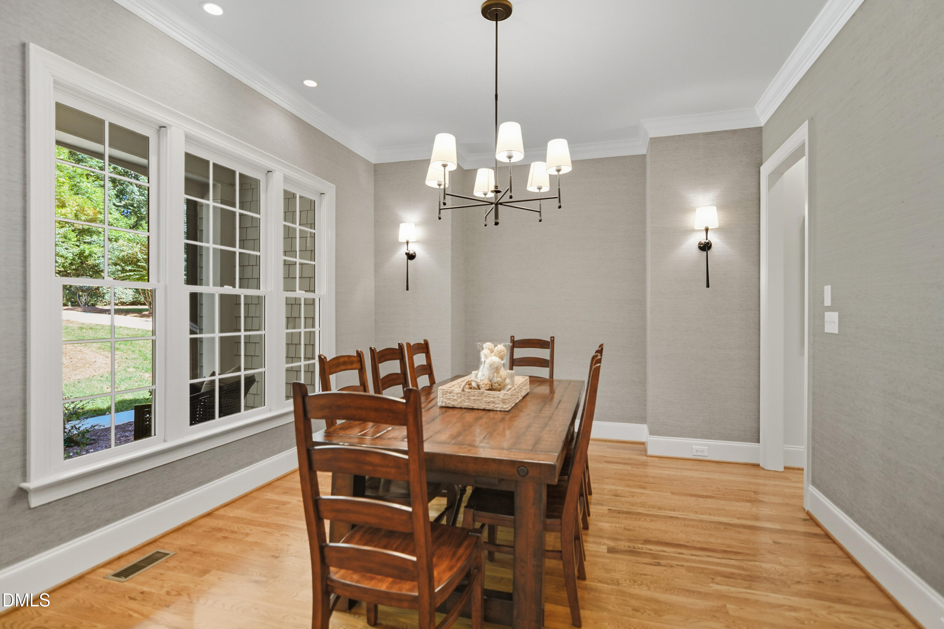 1409 Caistor Lane Raleigh, NC 27614 - Photo 7 of 46 a view of a dining room with furniture window and wooden floor