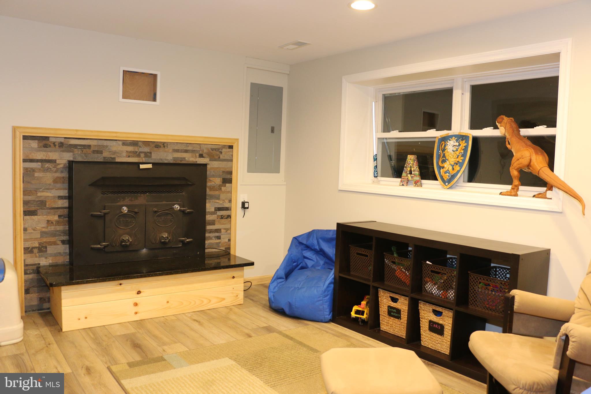 2373 North Firelane Road Southampton, NJ 08088 - Photo 8 of 19 Rec. room w/ wood burning stove insert