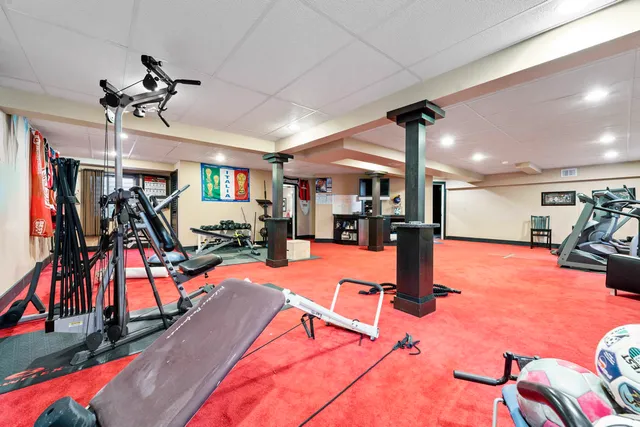 a backyard of a house with outdoor seating