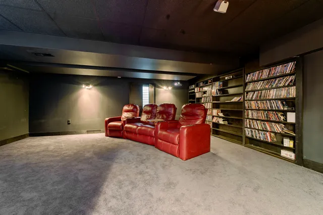a aerial view of a house with swimming pool and garden