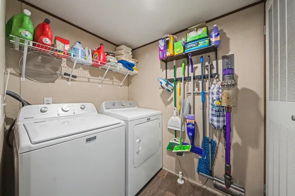a utility room with dryer and washer