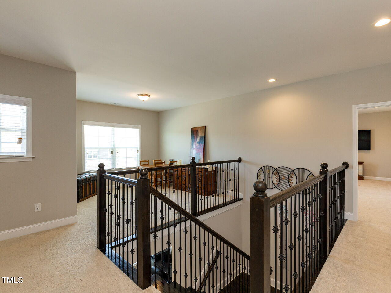 605 White Oak Pond Road Apex, NC 27523 - Photo 21 of 46 a view of a hallway with windows