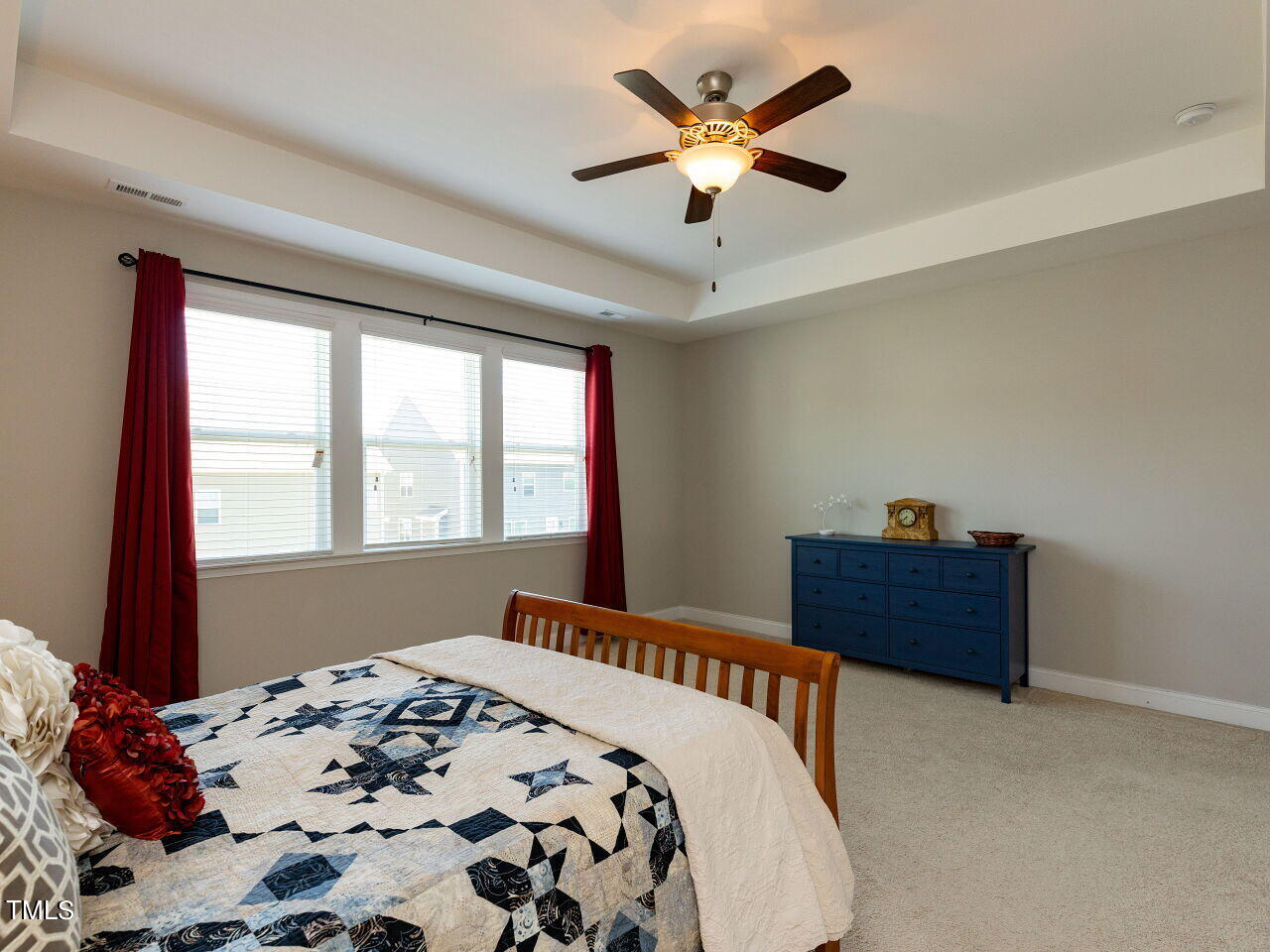 605 White Oak Pond Road Apex, NC 27523 - Photo 26 of 46 a bedroom with a bed and a window