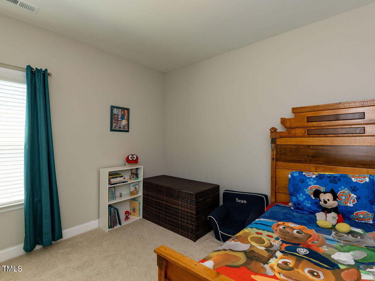 605 White Oak Pond Road Apex, NC 27523 - Photo 35 of 46 a bedroom with a bed and a window