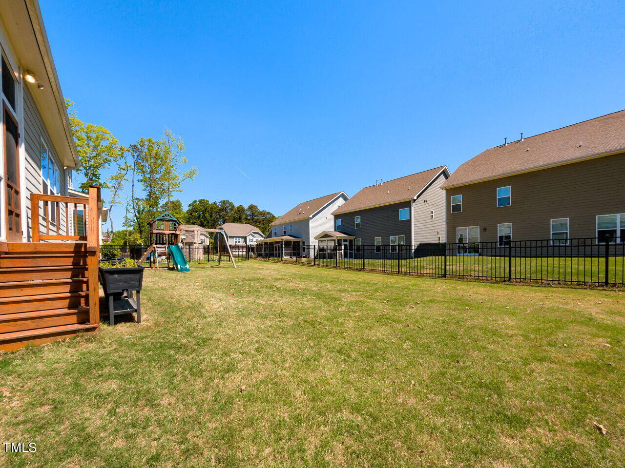 605 White Oak Pond Road Apex, NC 27523 - Photo 39 of 46 a front view of a building with swimming pool