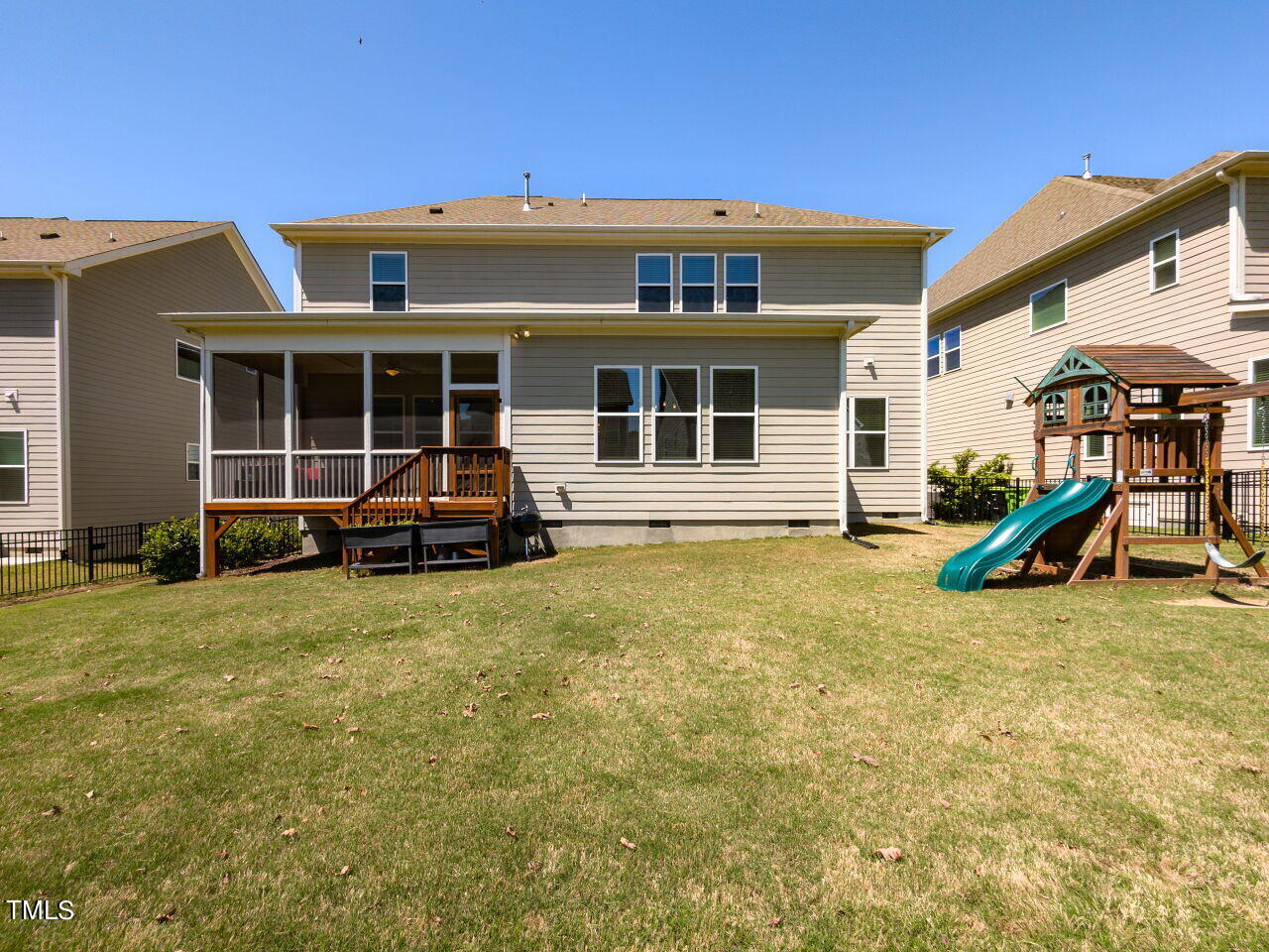 605 White Oak Pond Road Apex, NC 27523 - Photo 40 of 46 a view of a house with backyard