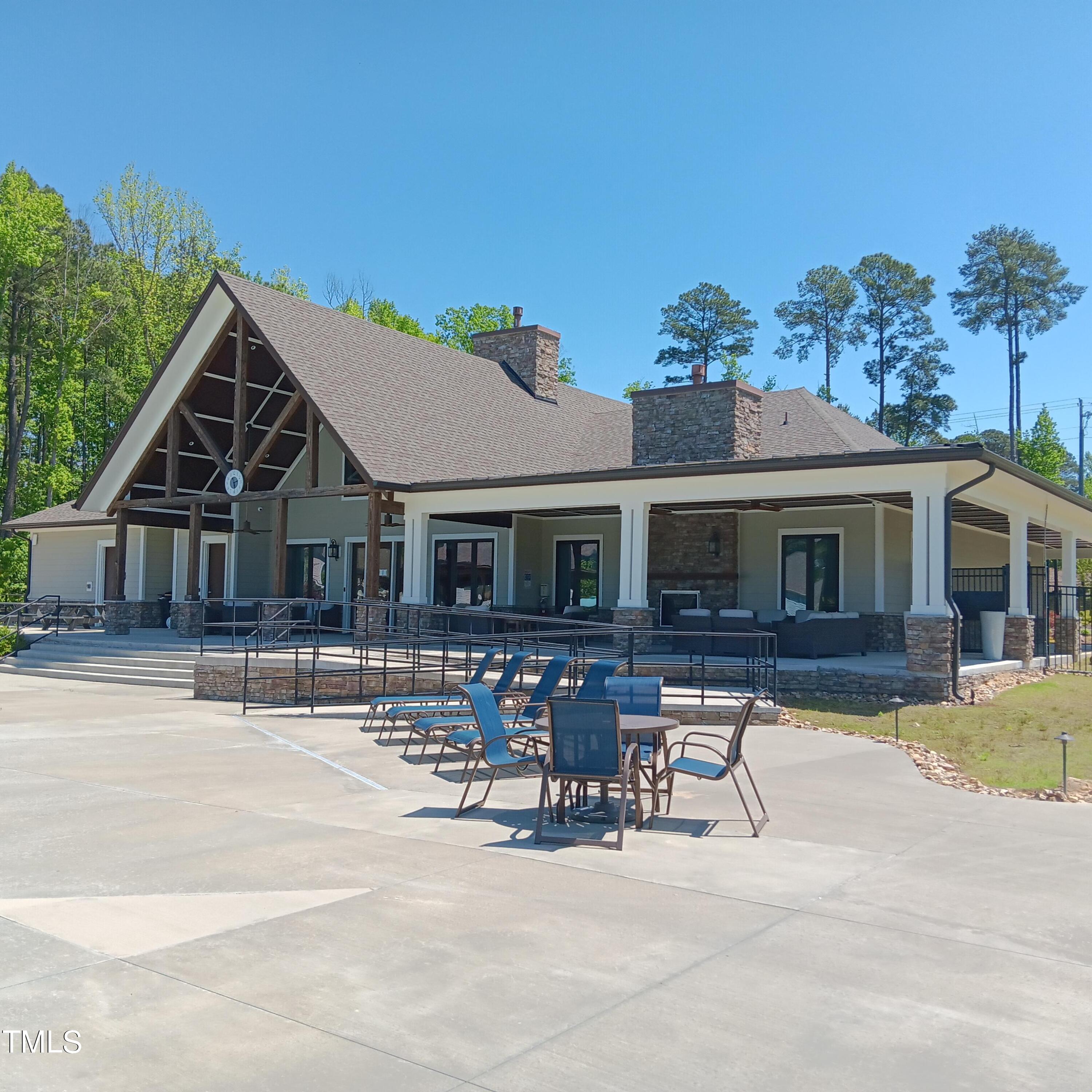 605 White Oak Pond Road Apex, NC 27523 - Photo 42 of 46 a view of a house with swimming pool and sitting area