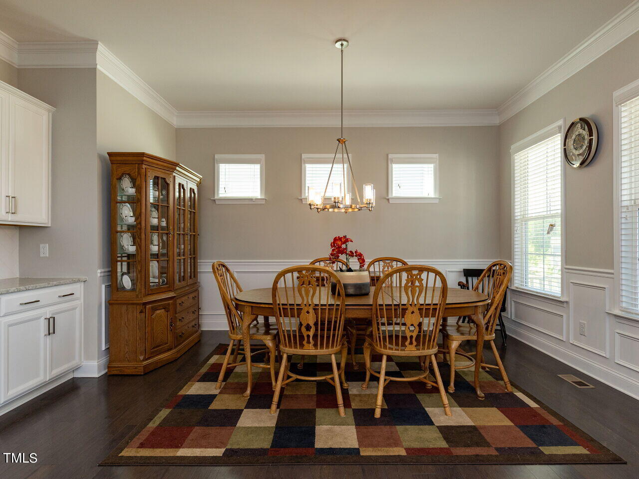 605 White Oak Pond Road Apex, NC 27523 - Photo 5 of 46 a view of a dining room with furniture window and wooden floor