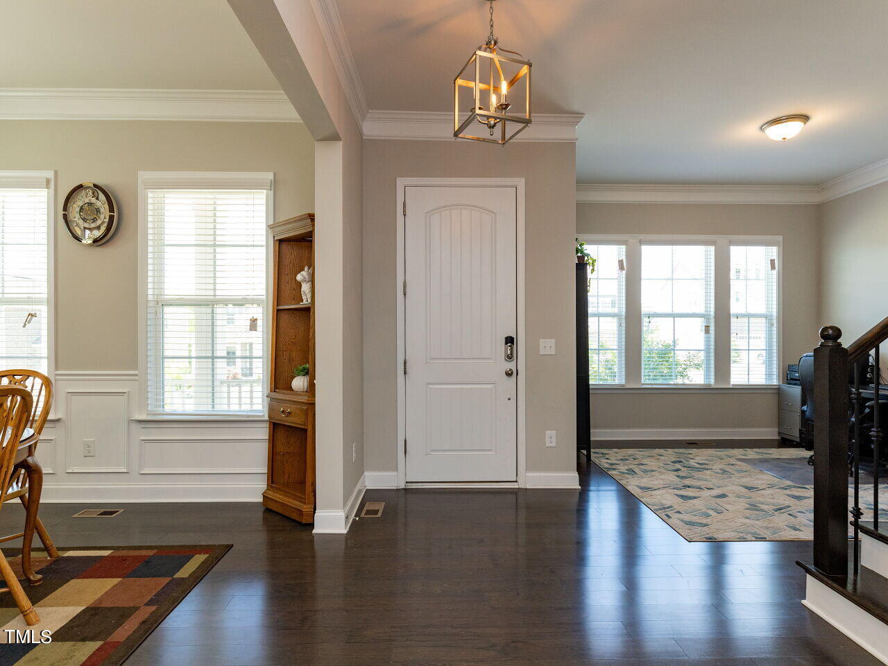 605 White Oak Pond Road Apex, NC 27523 - Photo 6 of 46 a view of livingroom with furniture wooden floor and front door
