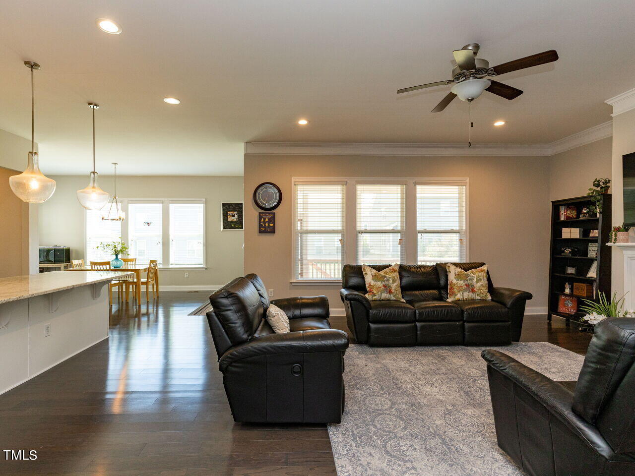 605 White Oak Pond Road Apex, NC 27523 - Photo 9 of 46 a living room with furniture and a large window