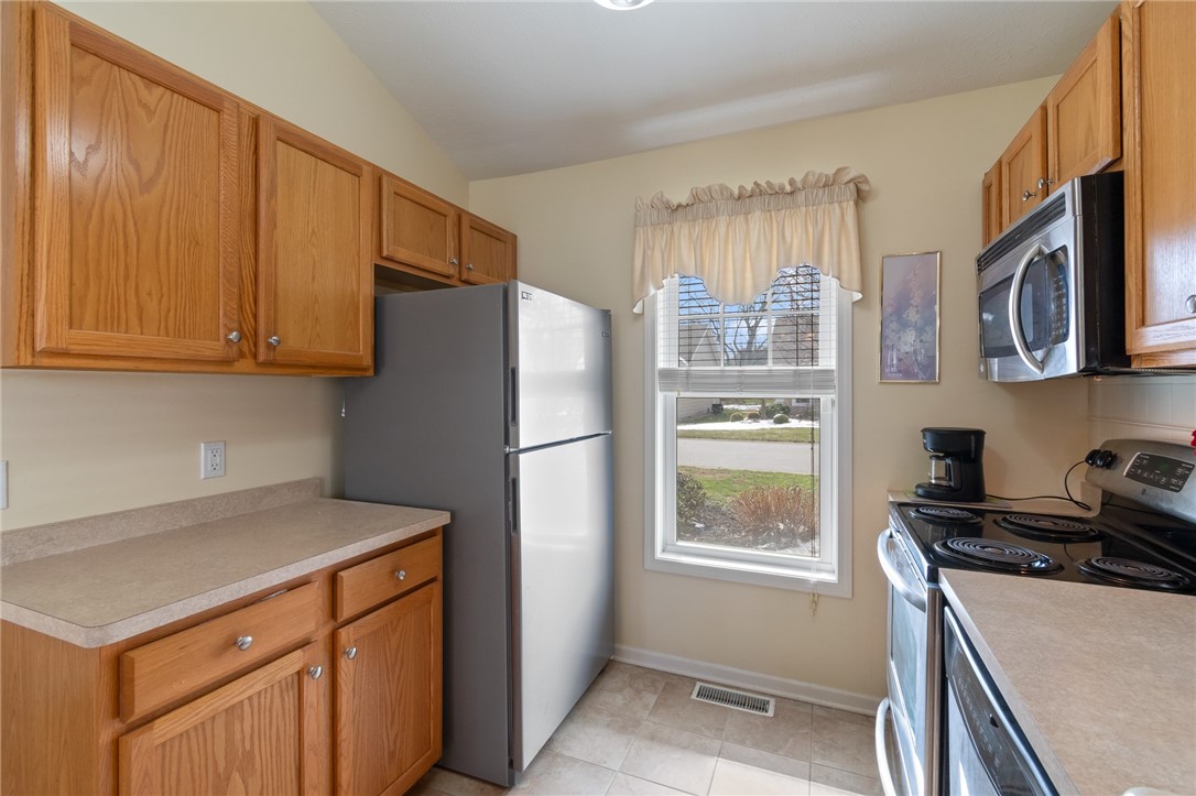 10 Turtle Wood Trail Greece, NY 14626 - Photo 11 of 28 The kitchen - bright open space!
