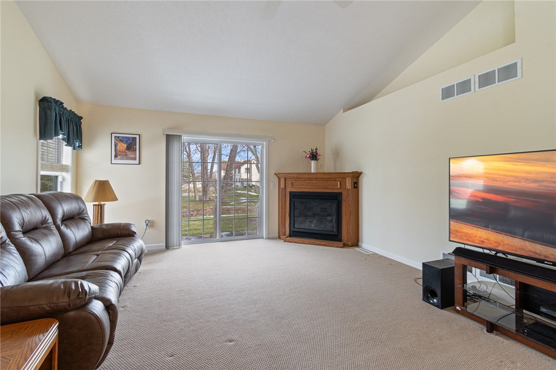 10 Turtle Wood Trail Greece, NY 14626 - Photo 13 of 28 There’s even a gas fireplace to warm up those chil