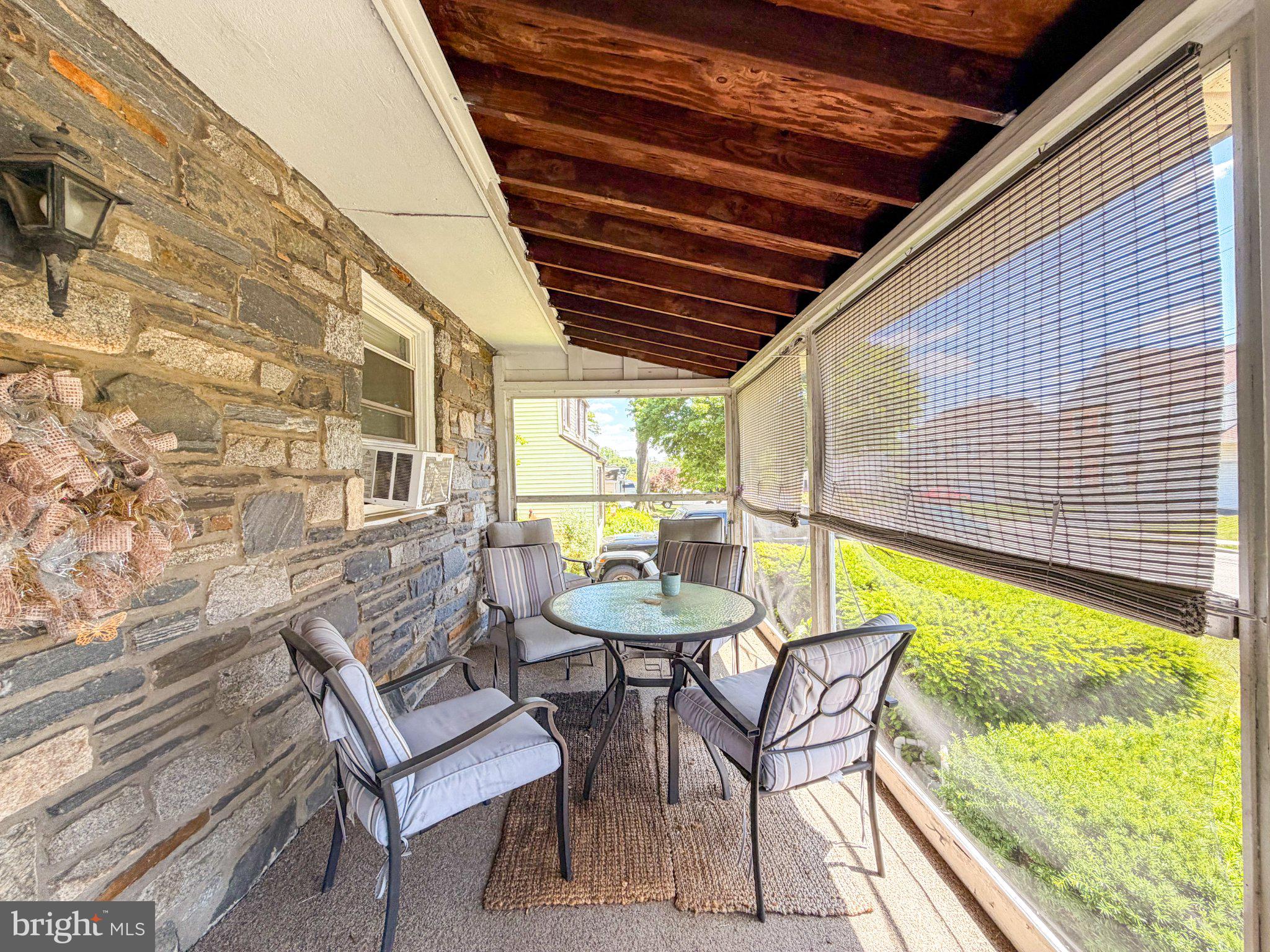 646 Amosland Road Morton, PA 19070 - Photo 11 of 11 Charming screened porch retreat.