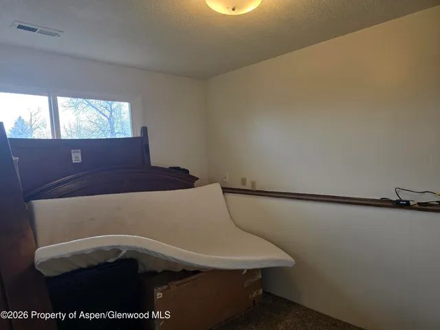 a view of yard covered with snow in outdoor space