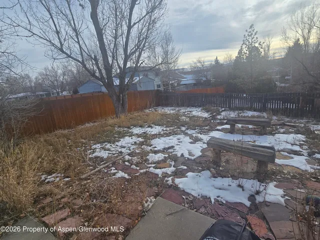 a view of balcony with wooden floor