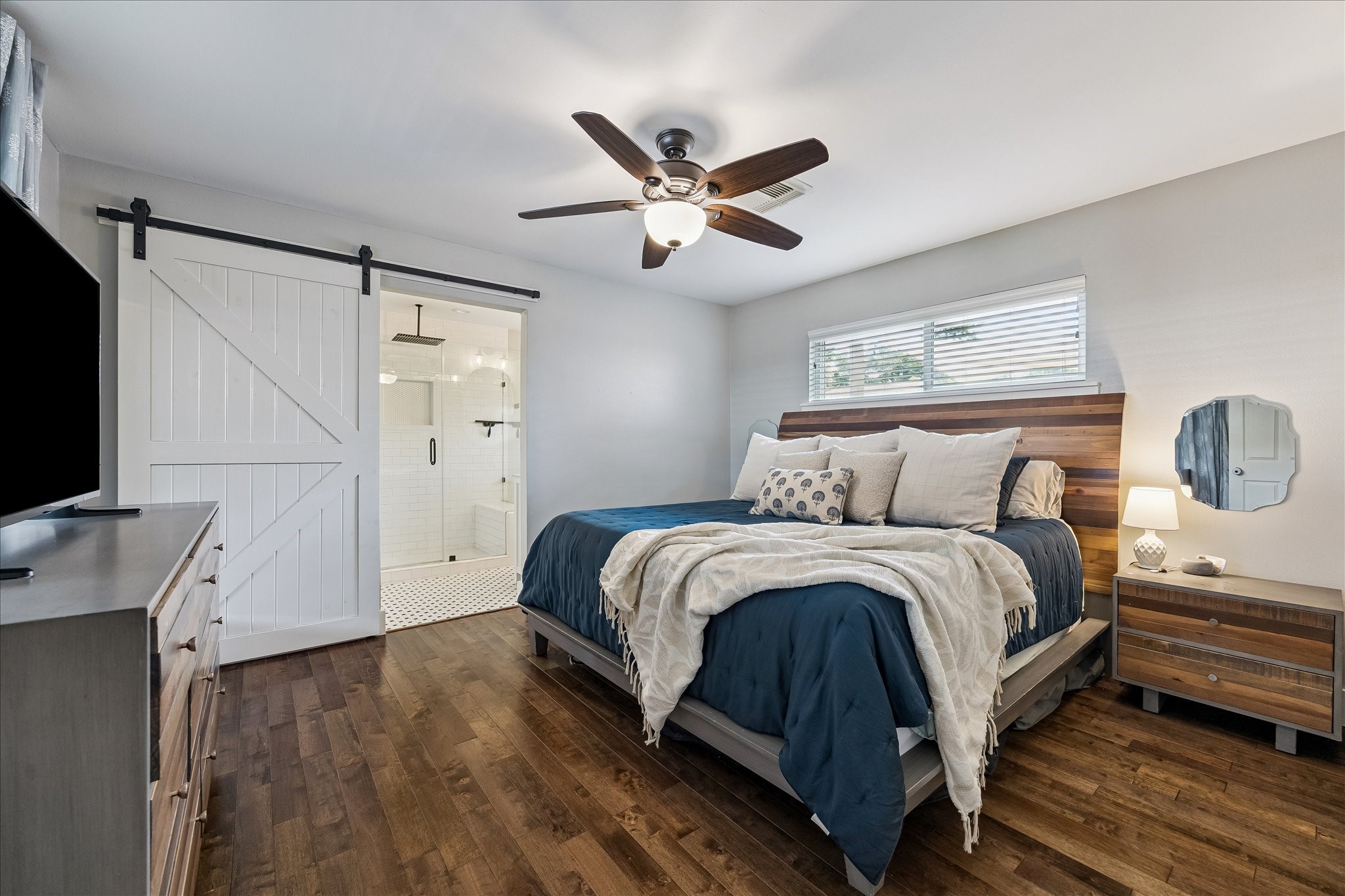 2203 Lamonte Lane Houston, TX 77018 - Photo 12 of 25 a bedroom with a bed and a flat screen tv