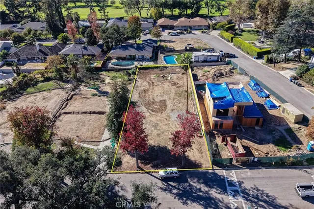 an aerial view of a houses with outdoor space