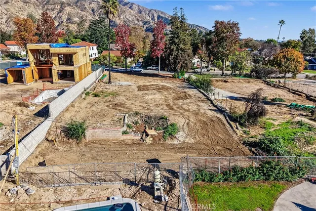 a view of a road with a building in the background