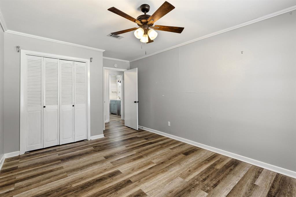 148 Royal Lane Commerce, TX 75428 - Photo 16 of 38 wooden floor in an empty room