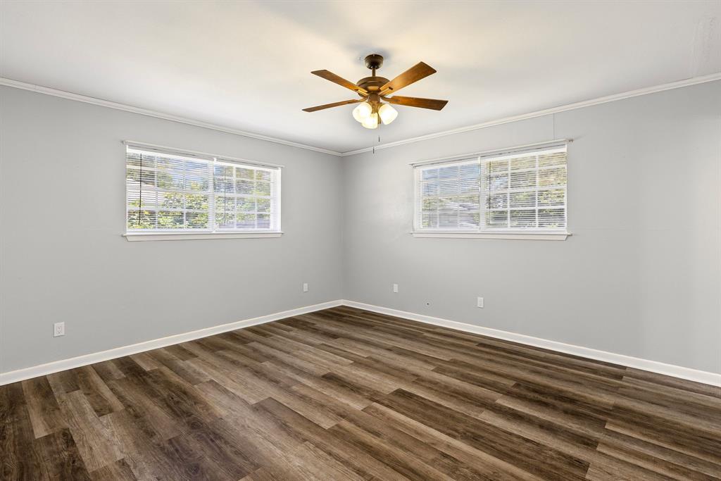 148 Royal Lane Commerce, TX 75428 - Photo 17 of 38 a view of an empty room with a window