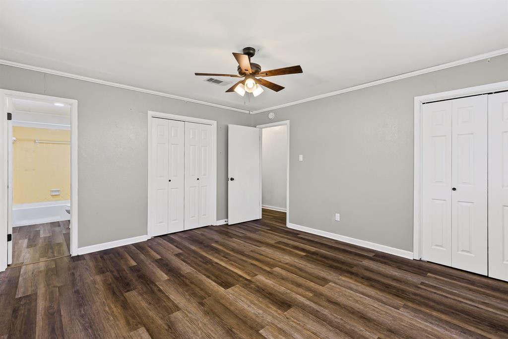 148 Royal Lane Commerce, TX 75428 - Photo 18 of 38 a view of empty room with wooden floor