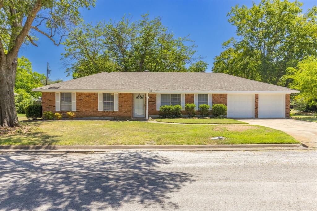 148 Royal Lane Commerce, TX 75428 - Photo 27 of 38 a view of a house with a patio yard and swimming pool