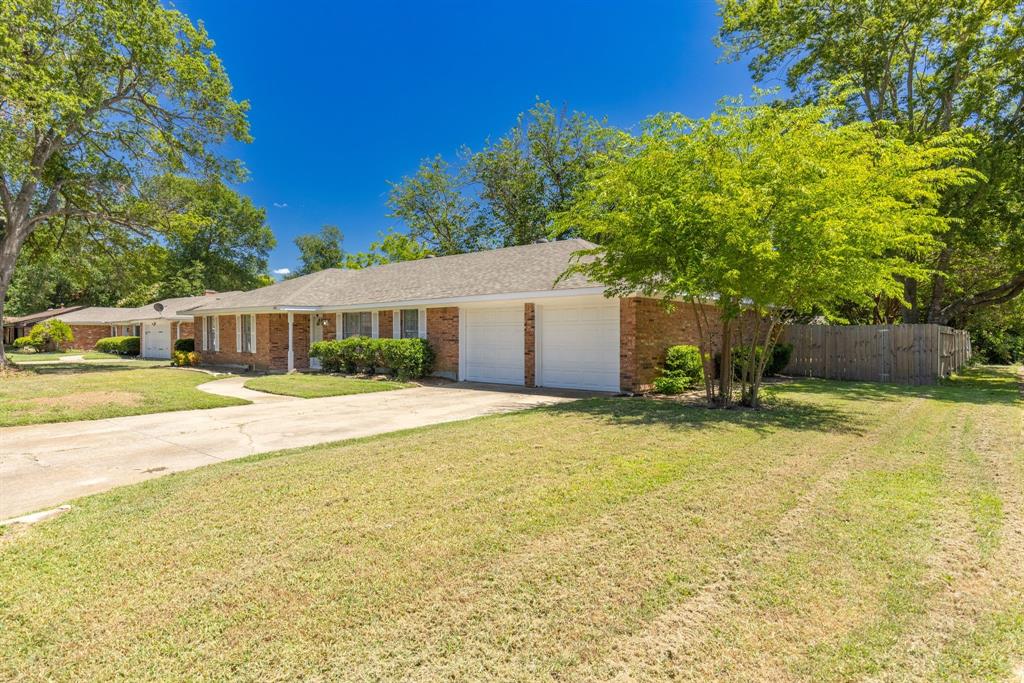 148 Royal Lane Commerce, TX 75428 - Photo 29 of 38 a house view with swimming pool in front of it