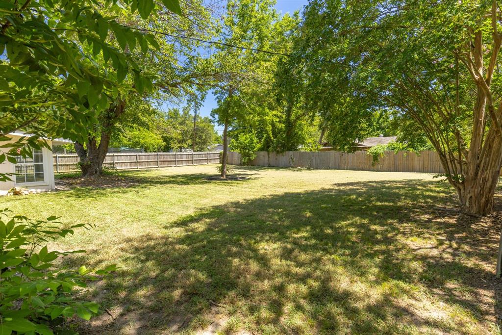 148 Royal Lane Commerce, TX 75428 - Photo 34 of 38 a swimming pool with an outdoor space and seating area