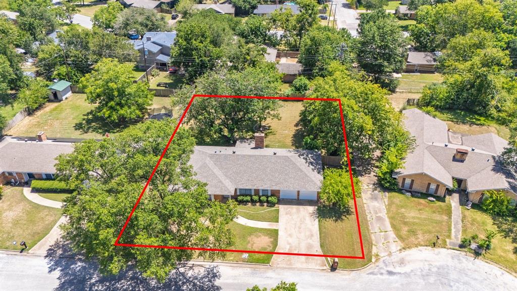 148 Royal Lane Commerce, TX 75428 - Photo 36 of 38 an aerial view of a house