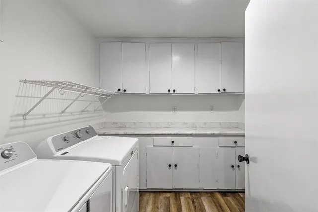 a utility room with dryer and washer