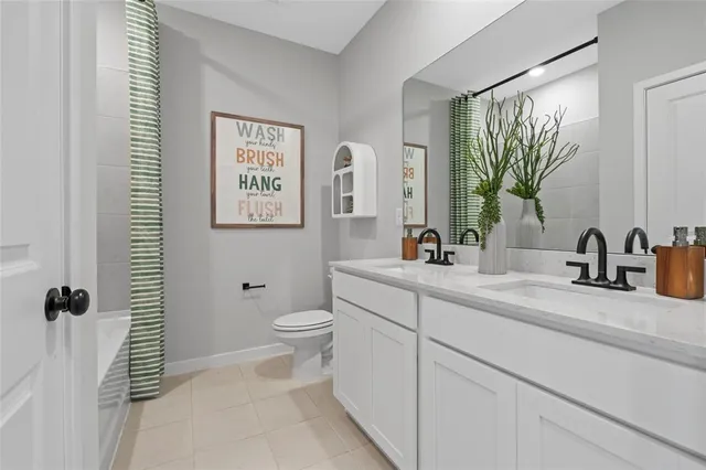 a bed room with a bed and a large window