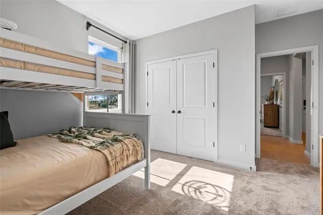 a view of a kitchen with stainless steel appliances and cabinets