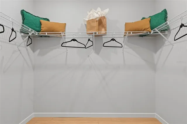 a kitchen with counter top space a sink and appliances