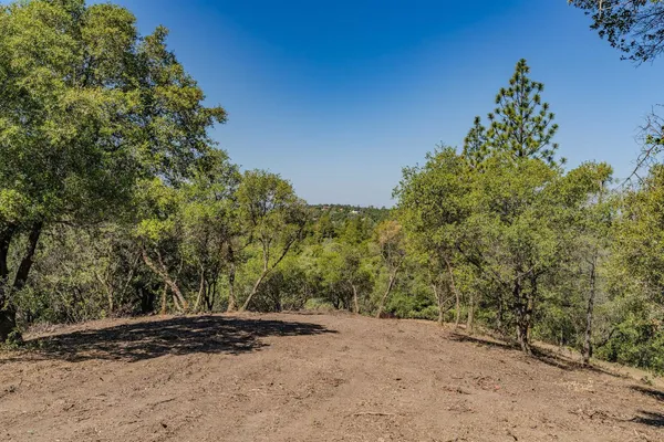 an aerial view of residential house with outdoor space