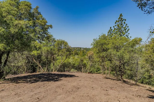 an aerial view of residential house with outdoor space