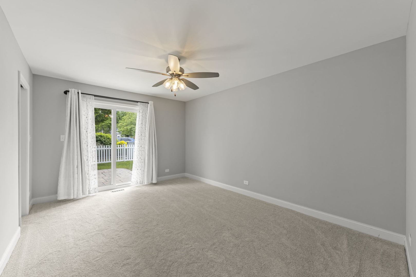1802 77th Street Naperville, IL 60565 - Photo 17 of 29 a view of an empty room with a window