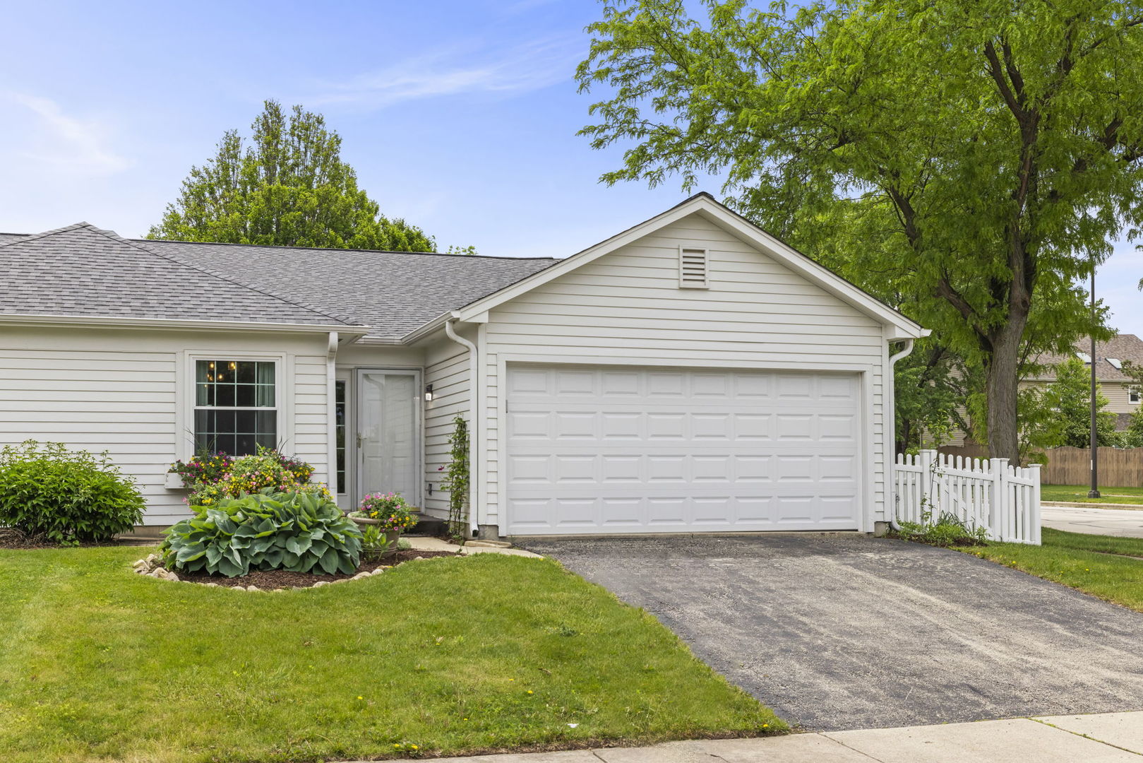 1802 77th Street Naperville, IL 60565 - Photo 2 of 29 a front view of house with yard and green space