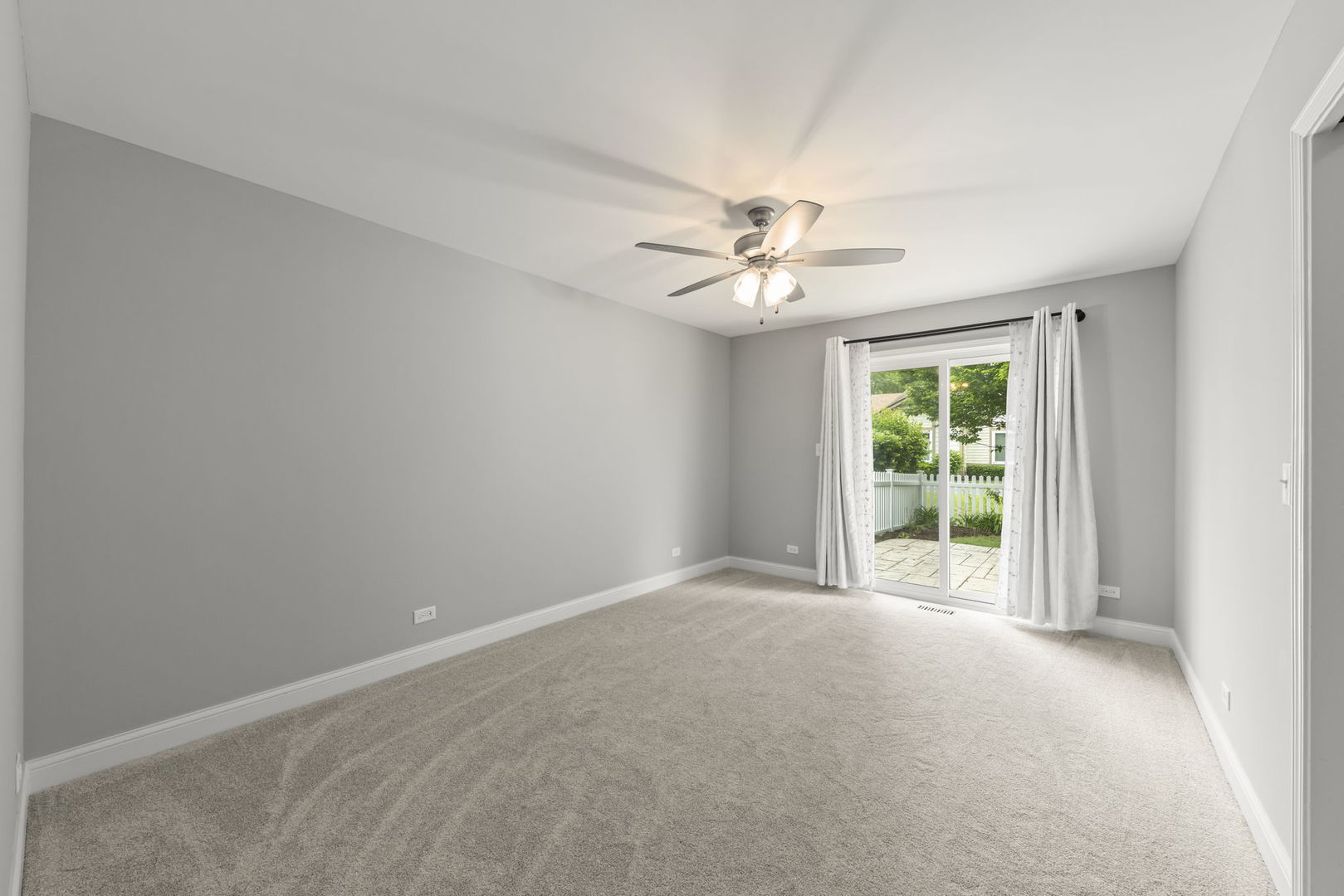 1802 77th Street Naperville, IL 60565 - Photo 21 of 29 a view of an empty room with a window