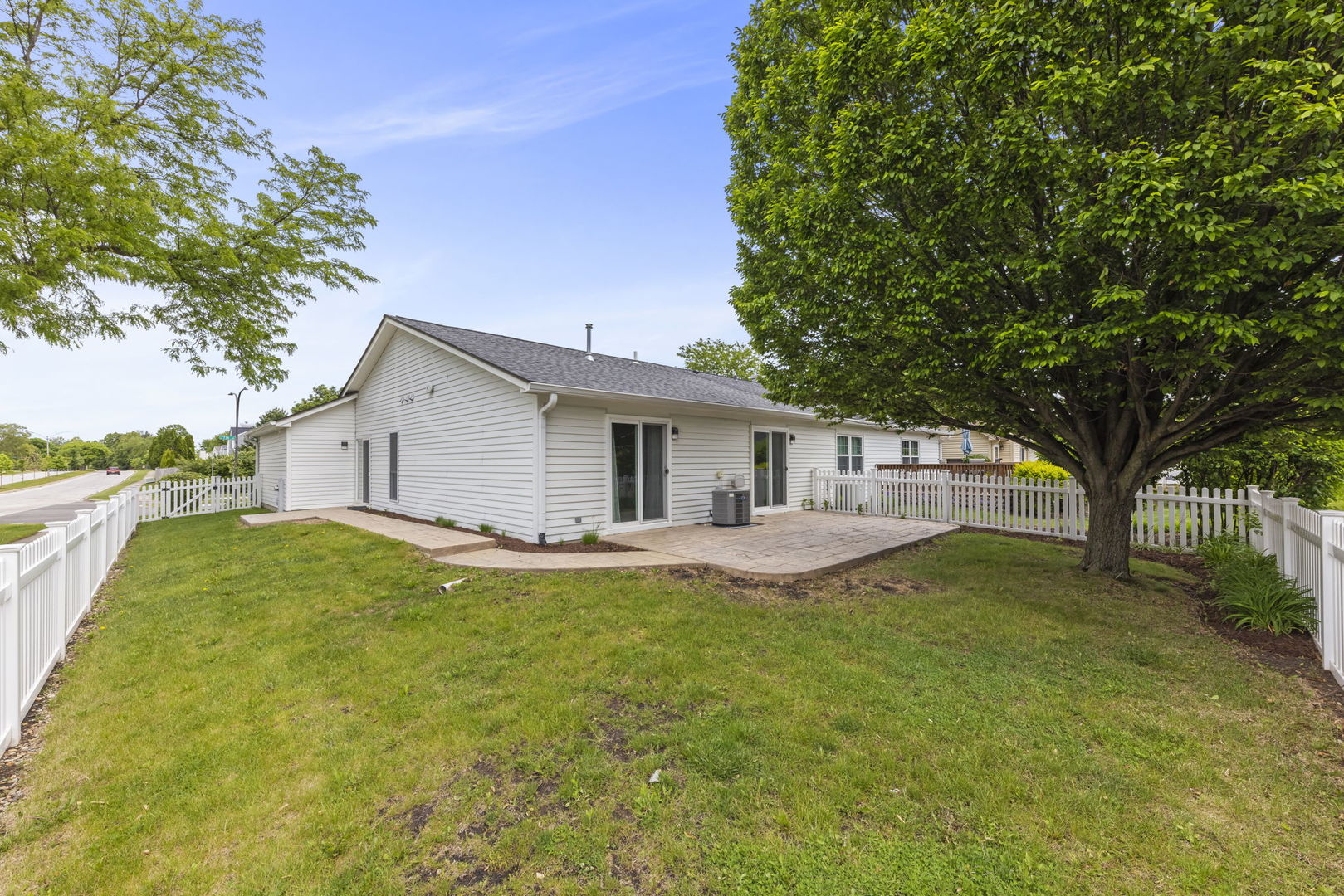 1802 77th Street Naperville, IL 60565 - Photo 28 of 29 a view of a house with a yard and tree